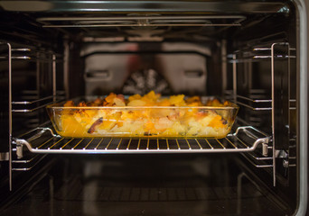 Photo of fried potatoes in oven