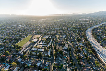 Aerial view of streets, homes and school in the Granada Hills and San Fernando Valley areas of Los Angeles, California.