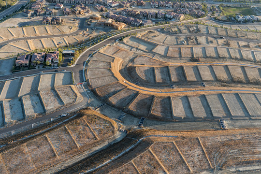 Aerial View Of Graded Dirt Lots Ready For New Home Construction.  