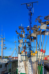 Ustka, Pomerania, Poland - Ustka fishing port with cutters and peers at the Baltic Sea shoreline