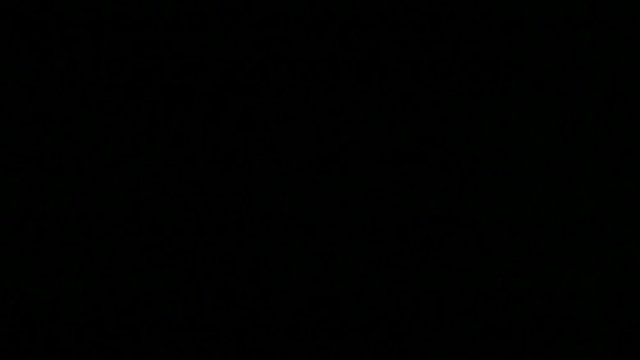 Shocker Protection, weapons. Taser, stun gun. Black, discharge current. Man's hand.