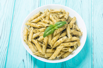 Italian penne pasta with sauce pesto