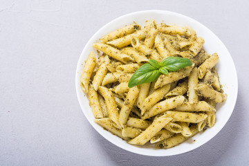 Italian penne pasta with sauce pesto