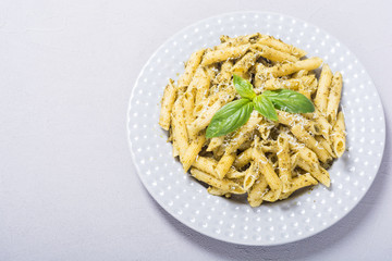 Italian penne pasta with sauce pesto