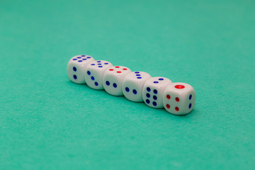 Small Playing Dice's on a Green Table