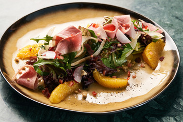 Vegetable salad with Smoked duck breast, close-up. 
