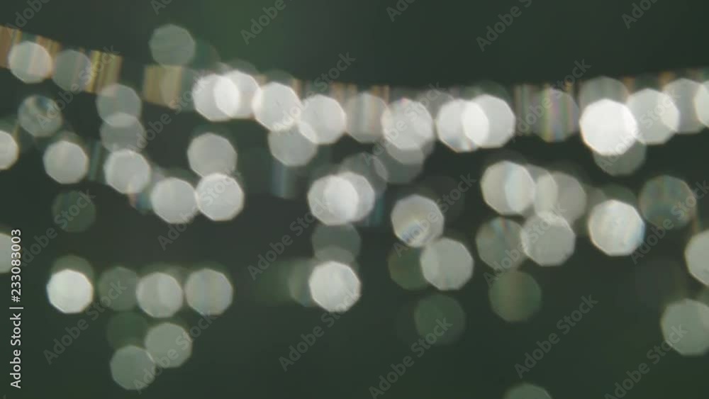 Poster out of focus macro shot of droplets in wet web creating abstract blurry bokeh