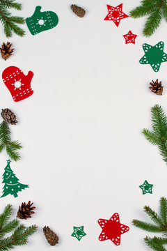 Christmas and New Year border or frame on white background. Winter holidays concept. Greeting template. Top view, flat lay