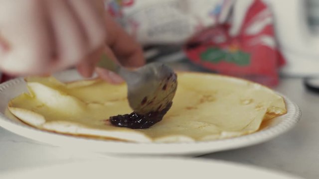 Making and filing pancakes. Low camera angle. And bright exposure.