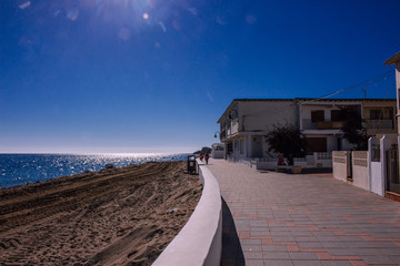 Obraz premium Sunny day on the street of La Cala de Mijas. Costa del Sol, Andalusia, Spain. Photo taken – 11 november 2018.