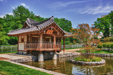 Korean Pagoda with small lake in the Park