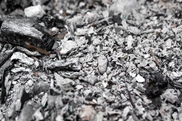 Gray ash from the oven background texture, cinder, grey ashes from the wood from the fireplace