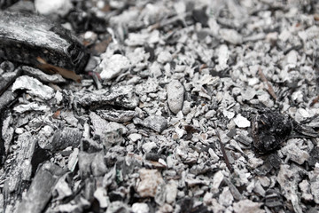 Gray ash from the oven background texture, cinder, grey ashes from the wood from the fireplace