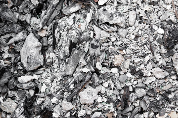 Gray ash from the oven background texture, cinder, grey ashes from the wood from the fireplace