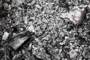 Gray ash from the oven background texture, cinder, grey ashes from the wood from the fireplace