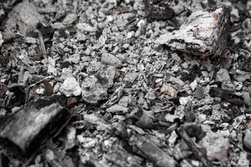 Gray ash from the oven background texture, cinder, grey ashes from the wood from the fireplace