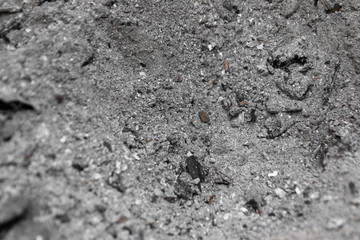 Gray ash from the oven background texture, cinder, grey ashes from the wood from the fireplace