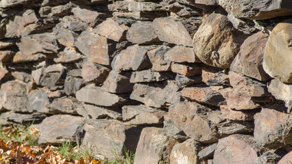 old stone wall of stones
