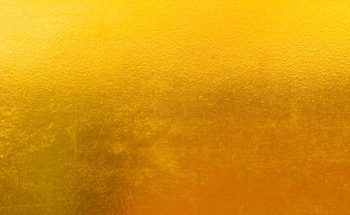 Shiny yellow leaf gold foil texture