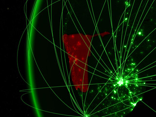 Namibia from space on green model of Earth with international networks. Concept of green communication or travel.