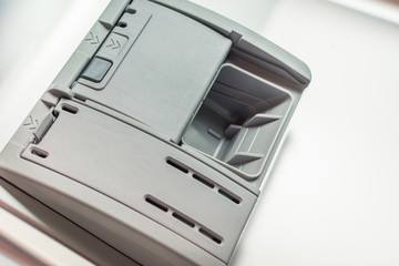 Open powder tray for powder tablets in a dishwasher