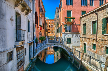 Fototapeta na wymiar Canal with bridge in Venice, Italy, HDR