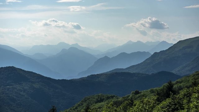Timelapse Cloudscape on mountain panorama, South-West Carnic Alps in Friuli.