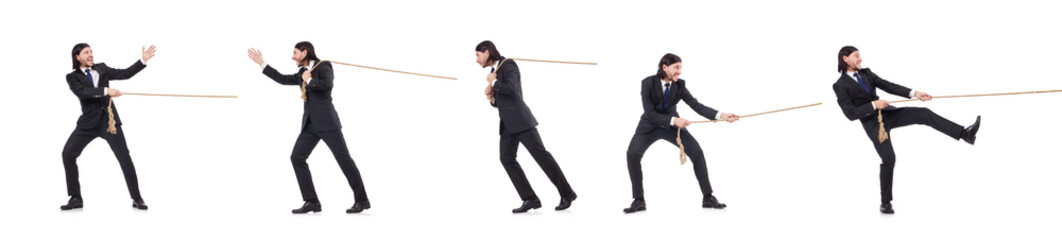 Young businessman pulling rope isolated on white