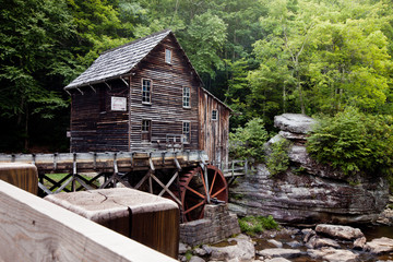 Glade Creek Grist Mill at Babcock State Park, West Virginia with stream and rocks
