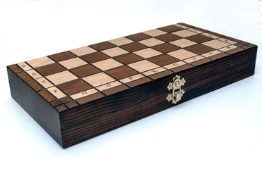 Chess pieces on a wooden board