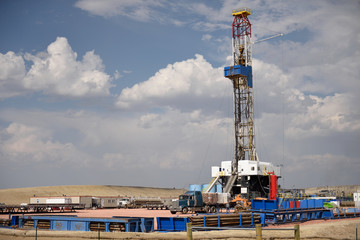 Land-based oil and gas exploration, drilling rig and well site in the energy-rich Powder River...