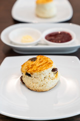 scone with butter and jam