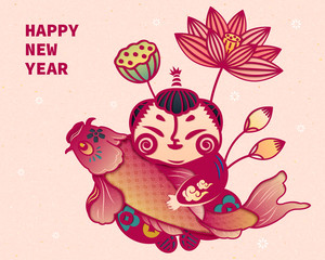 Chinese paper art child holds carp