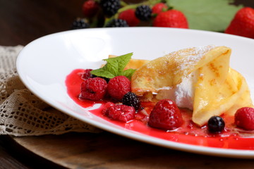 pancakes with berries and sugar