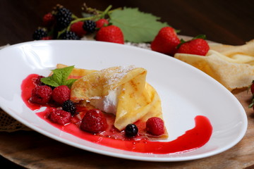 pancakes with berries and sugar