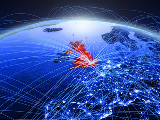 United Kingdom on blue digital planet Earth with international network representing communication, travel and connections.