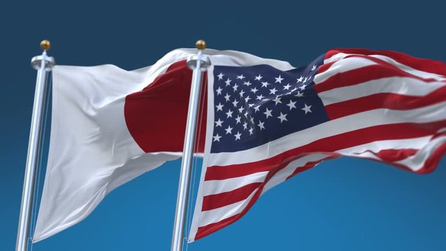 4k Seamless United States of America And japan Flags with blue sky background,A fully digital rendering,The flag 3D animation loops at 20 seconds,USA JP.