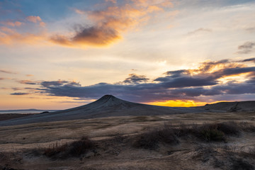 Mud volcanoes at sunset, beautiful amazing sky