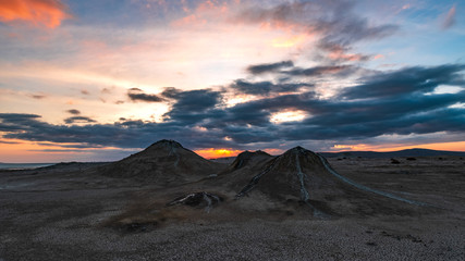 Mud volcanoes at sunset, beautiful amazing sky