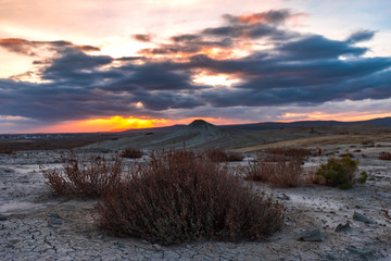 Mud volcanoes at sunset, beautiful amazing sky