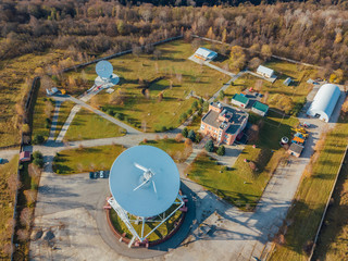 Radio telescope satellite dish, aerial view from drone