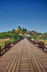 Fototapeta na wymiar The old wooden bridge Bridge collapse Bridge across the river and Wood bridge (Mon bridge )at sangklaburi, kanchanaburi, Province Asia thailand