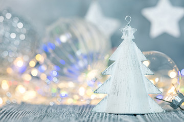 winter holiday decor concept. blurred garland lights and xmas decorations