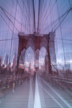 Abstract  brooklyn bridge view from walkway at sunrise