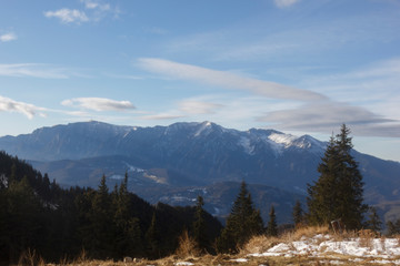 mountain slopes in the Carpathians, a famous ski resort in Romania, with ski lifts to the top of the slope