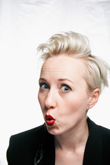 portrait of a business lady with a suit, red lips, white background, different emotions Business concept.