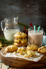 Baked Christmas cookies. Homemade Chip Cookies with Caramel and Salted Peanuts on a wooden table. Copy space.
