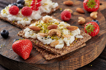 Sandwich with nuts and berrie Useful breakfast.