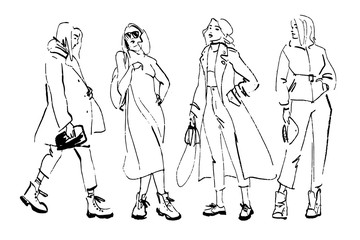 Vector fashion illustration of modern young girl models in spring autumn cloth collection isolated on white background. Hand drawn lady in sketch style. Perfect for banners, advertising, flayers etc.