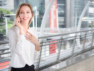 Fototapeta premium Asian beautiful girl feel happy. smiling woman show hand up successful sign action